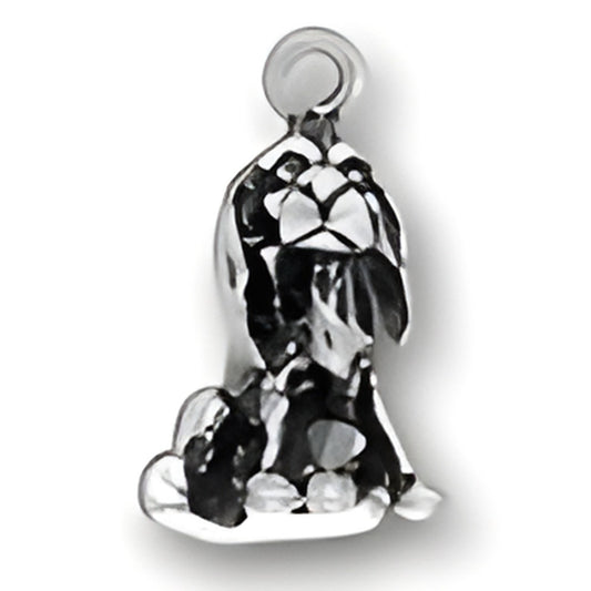 Charm Factory Cocker Spaniel Charm made of sterling silver, featuring detailed design of a sitting cocker spaniel.