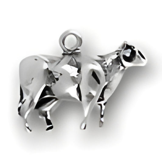 Charm Factory Cow Charm made of polished silver, featuring a detailed, three-dimensional cow design.
