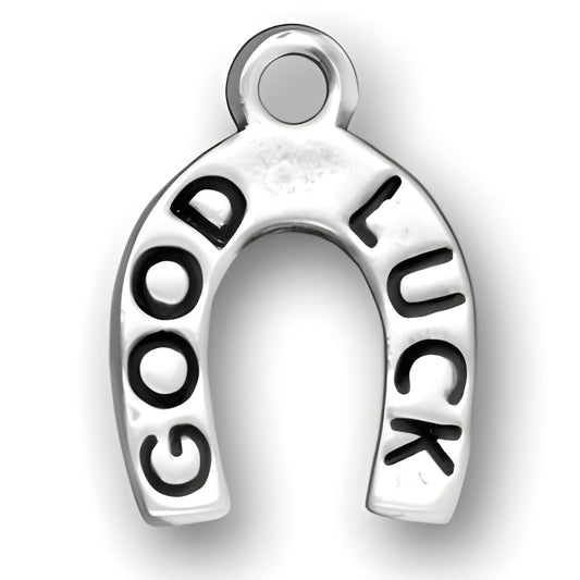 Good Luck Horseshoe Charm made of sterling silver, featuring the words 'GOOD LUCK' engraved on the surface.