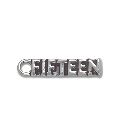 Sterling Silver Fifteen Charm featuring the word 'FIFTEEN' in a cut-out design with a loop for attachment.