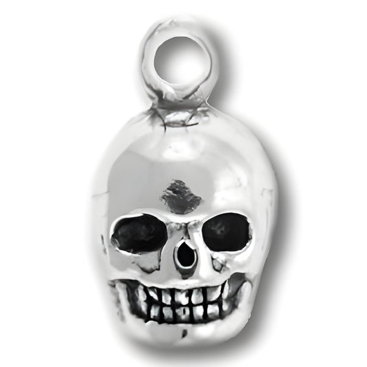 Sterling Silver Skull Charm featuring detailed skull design with hollow eyes and a grinning mouth.