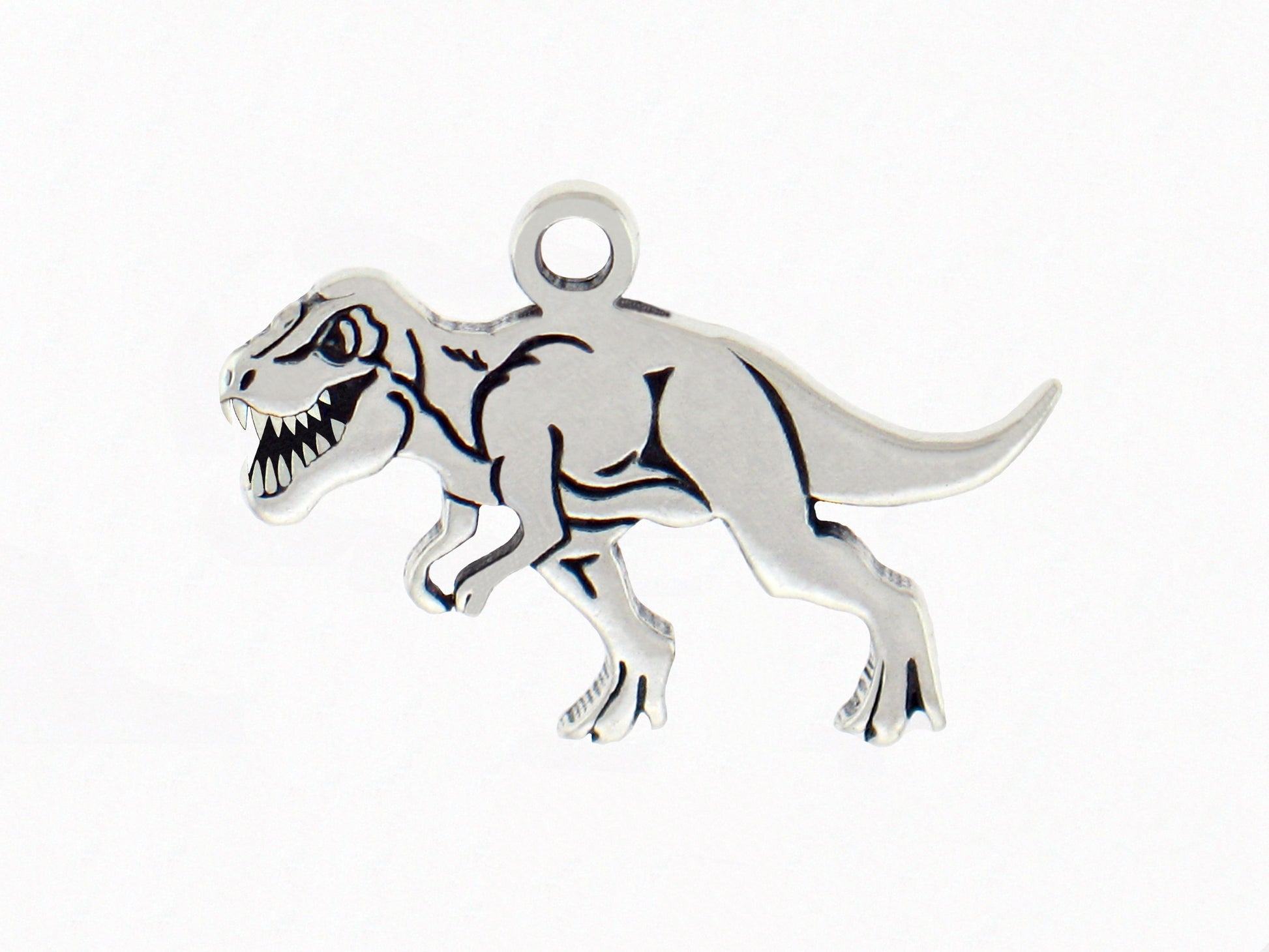 Charm Factory Dinosaur Charm, a silver-toned charm featuring a detailed T-Rex design with a loop for attachment.