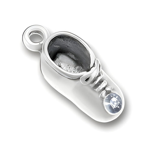 Charm Factory Baby Shoe Charm in silver with an April diamond accent, featuring detailed laces and a shiny finish.