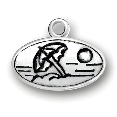 Beach Scene Charm in sterling silver featuring an umbrella, sun, and waves in an oval design.