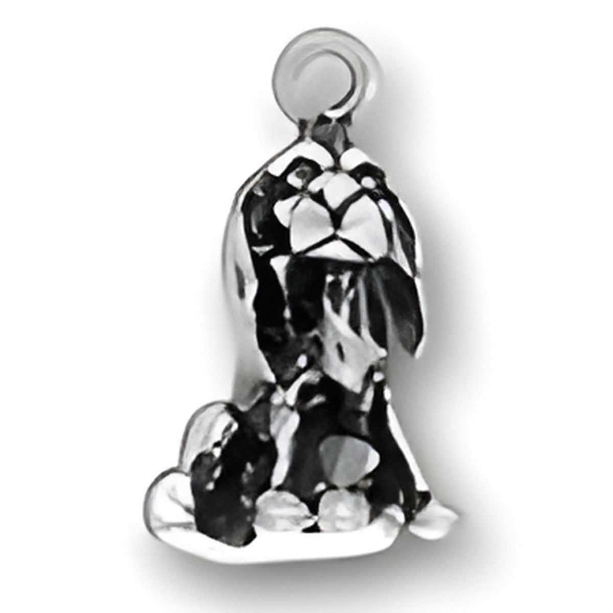 Charm Factory Cocker Spaniel Charm made of sterling silver, featuring detailed design of a sitting cocker spaniel.