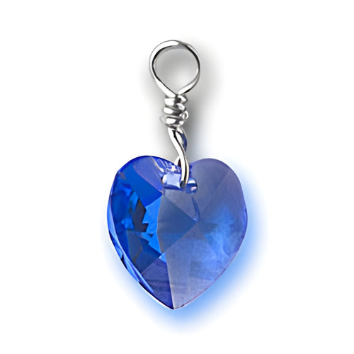 Crystal Birthstone Heart Charm made of blue crystal with a sterling silver loop for attachment.