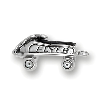 Charm Factory Flyer Wagon Charm, made of silver, features detailed design with wheels and engraved lettering.
