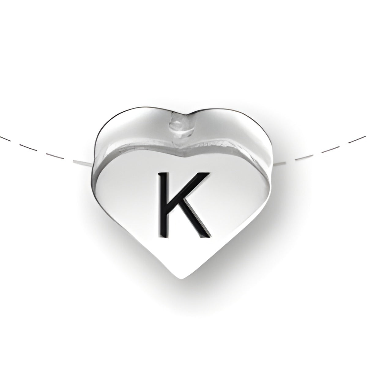 Heart-shaped bead in sterling silver featuring the letter 'K' in black. Designed for charm jewelry.