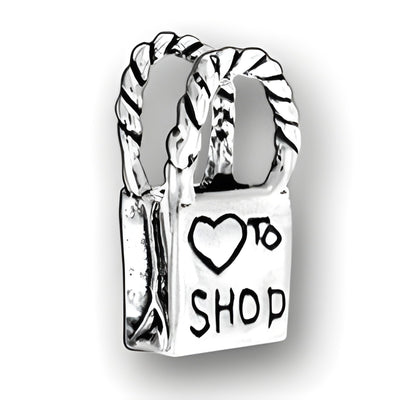 Charm Factory Heart to Shop Shopping Bag Charm, crafted from silver, features a bag with 'Heart to Shop' inscription.
