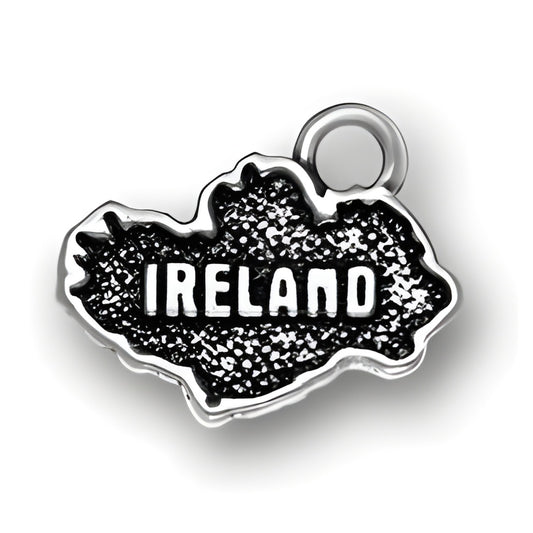 Ireland charm made of sterling silver, featuring a textured map outline with the word 'IRELAND' prominently displayed.