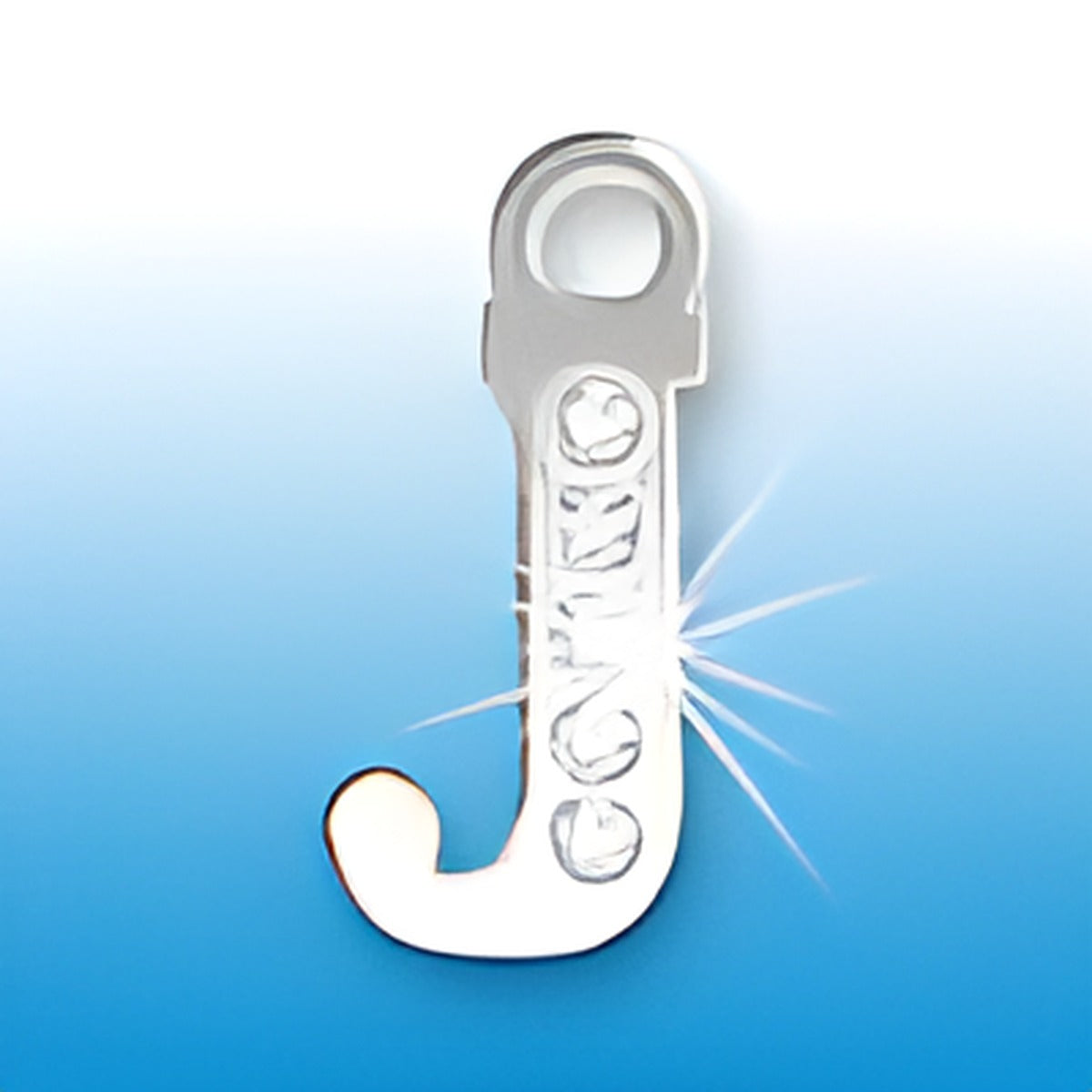 Letter J initial charm made of sterling silver, adorned with crystals, featuring a shiny finish against a blue background.