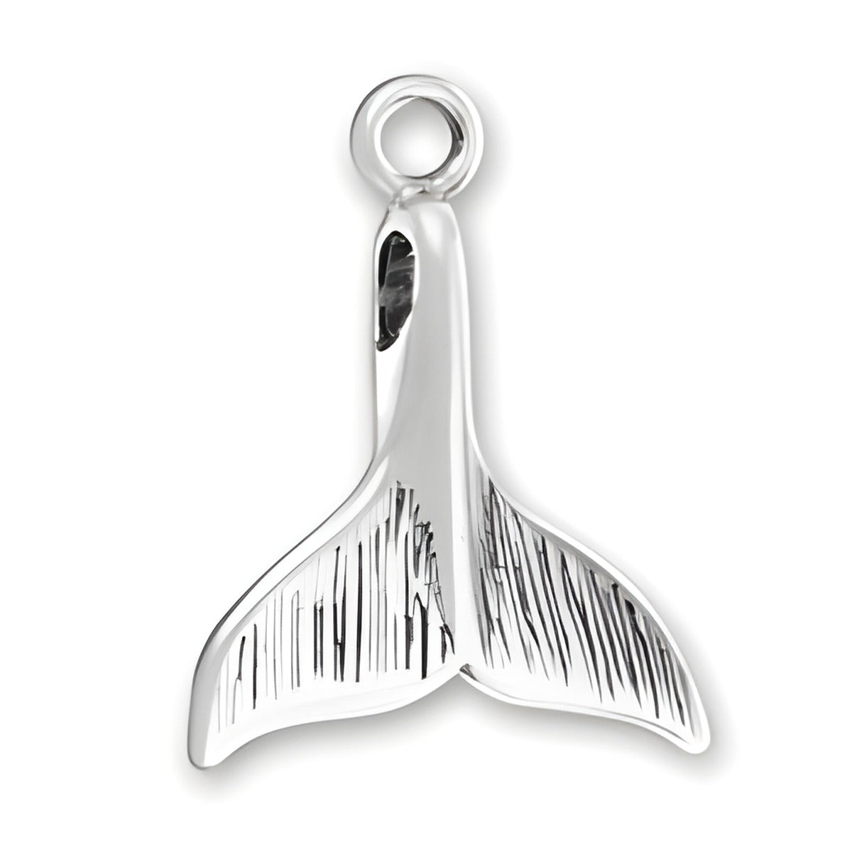 Charm Factory Medium Whale Tail Charm made of polished silver, featuring detailed engravings on the tail fins.