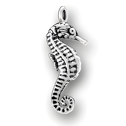 Charm Factory Seahorse Charm made of sterling silver, featuring intricate detailing and a curled tail design.