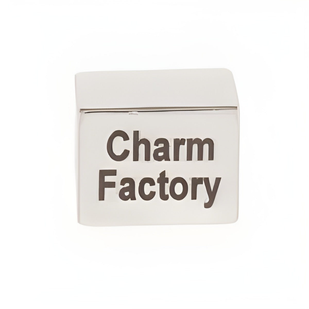 Small personalized rectangle runner bead made of sterling silver, featuring the engraved text 'Charm Factory'.