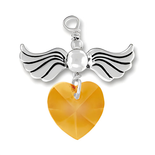Sterling Silver Love Taking Flight charm featuring wings and a Topaz crystal heart.