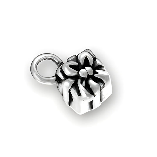 Sterling Silver Present Charm featuring a detailed wrapped gift with a bow on top, showcasing intricate design.