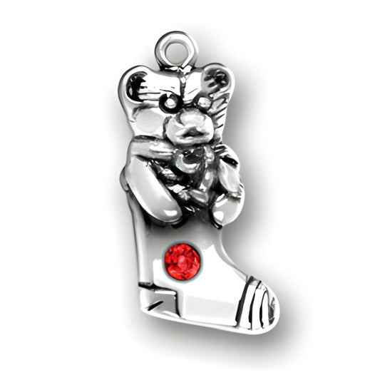 Sterling Silver Teddy Bear Stocking charm featuring a teddy bear holding a toy, adorned with a red crystal.