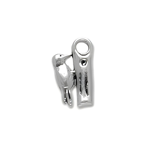 Woodpecker Charm made of sterling silver, featuring a detailed bird design with a loop for attachment.