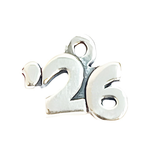 Charm Factory Year '26 Charm made of polished silver, featuring the numbers 2 and 6 in a stylish design.